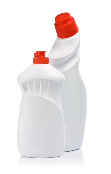 Duas garrafas brancas com tampas vermelhas — Fotografia de Stock