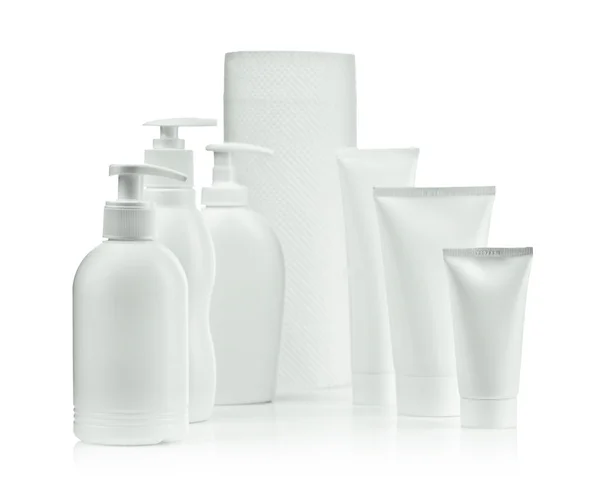 Spray butelkach i rury i ręcznik — Zdjęcie stockowe
