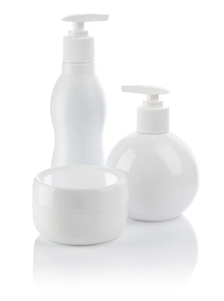 Beyaz cosmetical sprey şişe ve krem — Stok fotoğraf