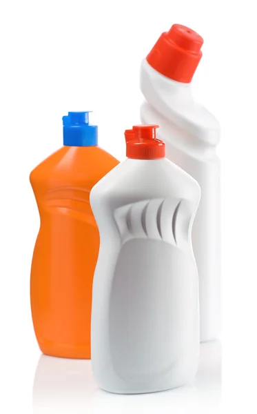 Oranje en witte flessen voor het reinigen — Stockfoto