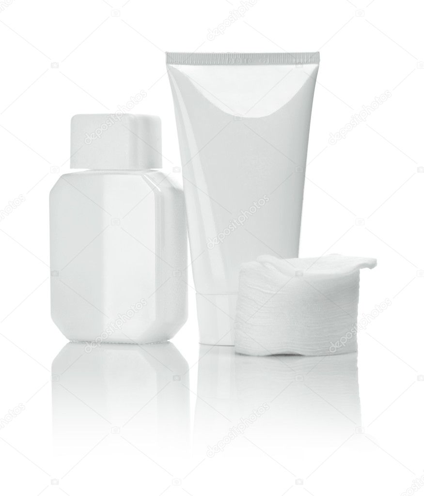 White ceramical bottle and tube with cotton pads