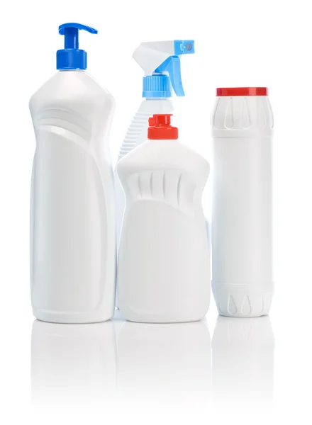 Cuatro botellas blancas para limpiar — Foto de Stock