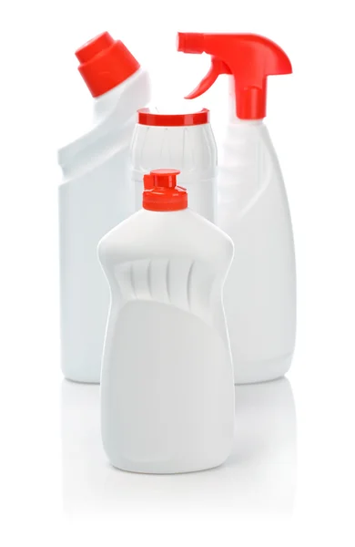 Quatro garrafas limpas brancas — Fotografia de Stock