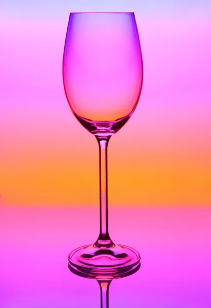 Glass on a colored background — Stock Photo, Image