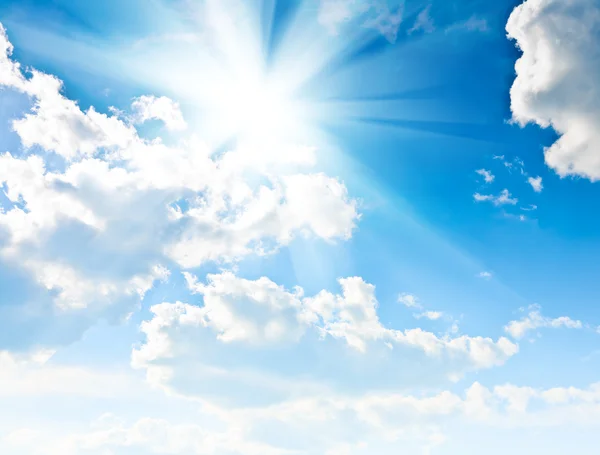 Blue cloudy sky with sun — Stock Photo © mihalec #2464275