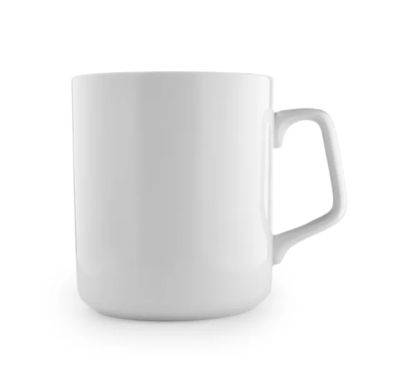 Белая чашка на белом фоне — стоковое фото