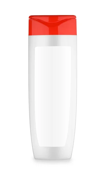 Серая бутылка с красной крышкой — стоковое фото