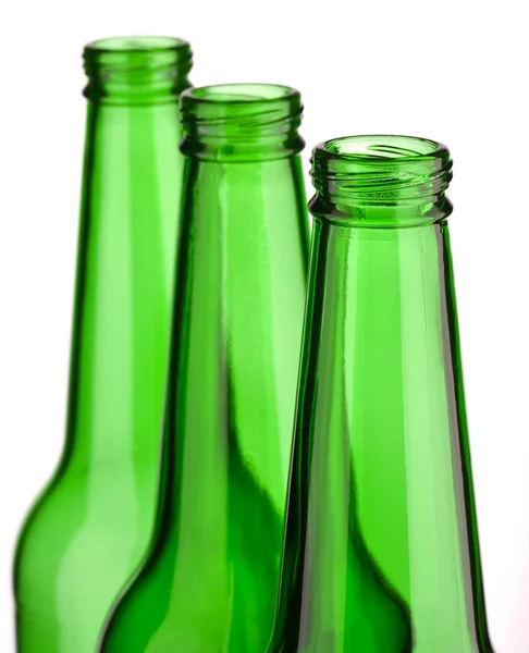 Parte superior de três garrafas isoladas — Fotografia de Stock