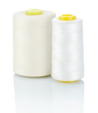 Two spool of white thread clipart