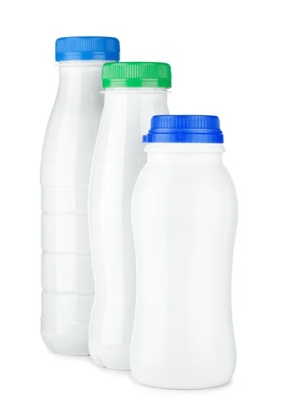 Rad med tre vita flaska — Stockfoto