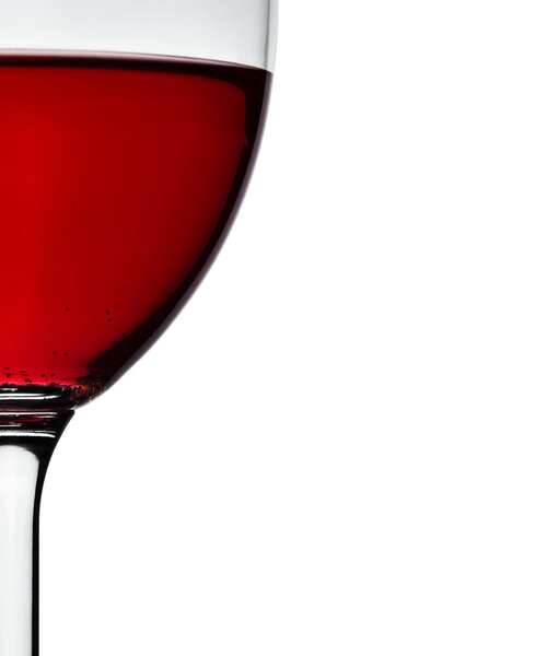 Crop of wineglass with red wine