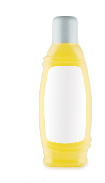 Bottiglia gialla di shampoo isolato — Foto Stock