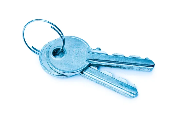 To blå tonet nøgler isoleret - Stock-foto