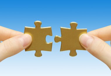 Puzzle in hands clipart