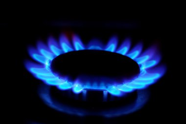 Gas stove in the dark clipart