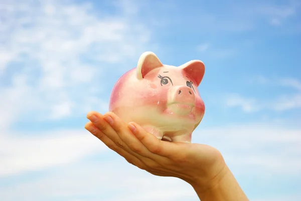 Piggy bank in hand — Stock Photo, Image