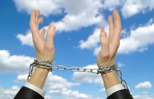 Hands in chains — Stock Photo, Image