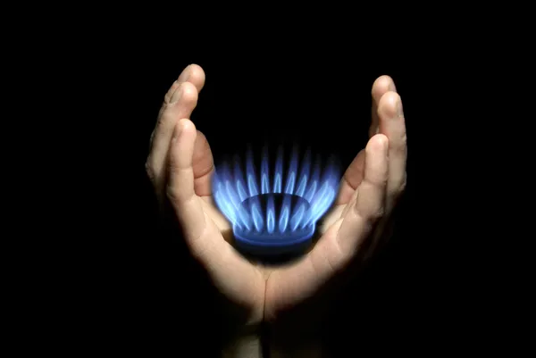 Gas in handen — Stockfoto