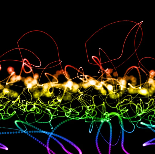 Linhas pontilhadas de néon colorido abstrato sobre preto — Fotografia de Stock