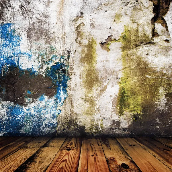 Grunge parede pintada e piso de madeira em uma sala — Fotografia de Stock