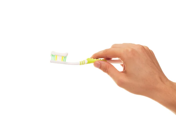 Hand med tandborste isolerade över vit bakgrund — Stockfoto