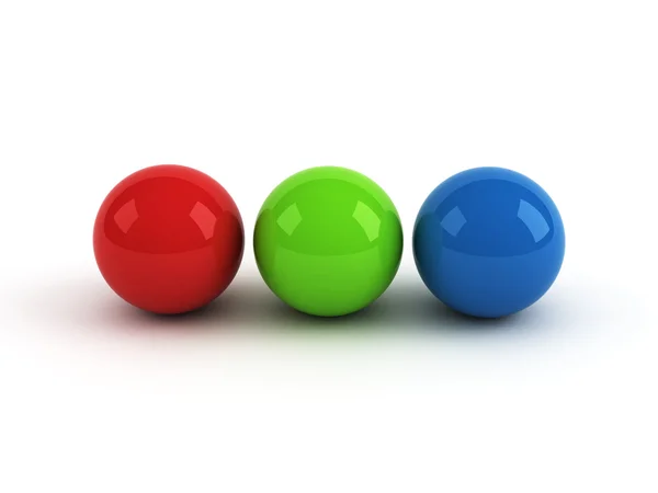 Vermelho verde bolas azuis sobre fundo branco — Fotografia de Stock