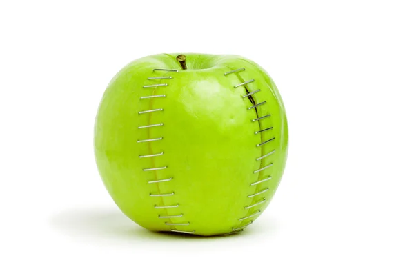 Häftad grönt äpple — Stockfoto