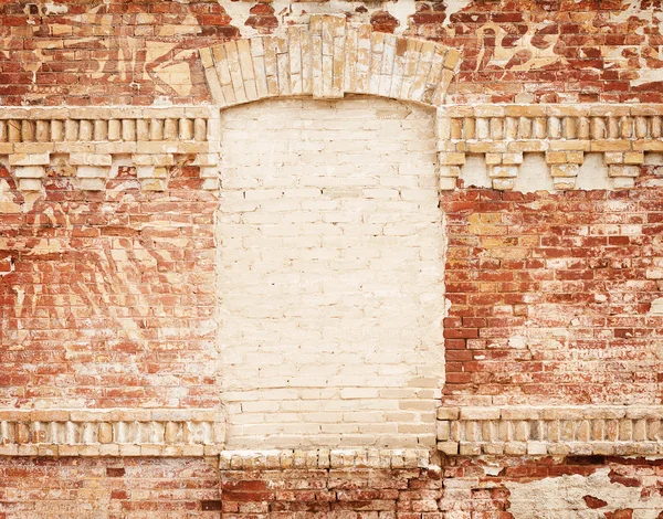 Grunge tuğla duvar merkezinde boş çerçeve ile — Stok fotoğraf