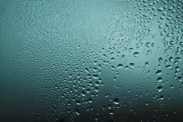 Kapky vody na textury skla. — Stock fotografie