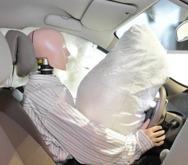 Mannequin in a car clipart