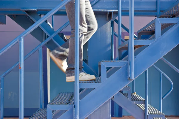 A man running up the stairs — Stock Photo, Image