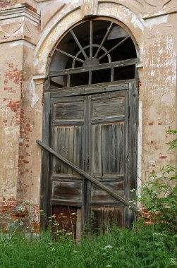 Locked Door of Abandoned Church clipart