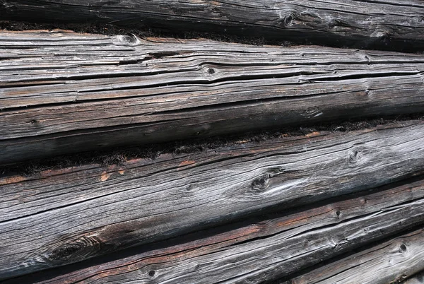 Détail du mur de maison en bois rond — Photo