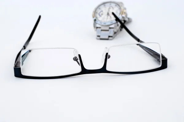 Brýle a hodinky — Stock fotografie