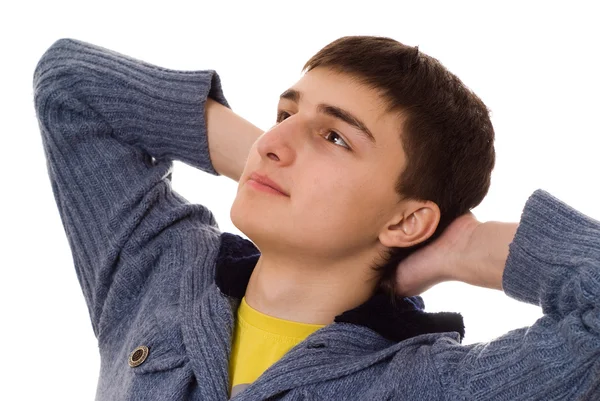 Junger Mann steht und denkt — Stockfoto