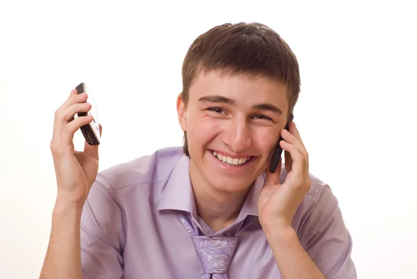 Porträtt av en affärsman med en telefon på ett dugg — Stockfoto