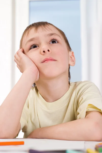 Boy sitting and dreaming — Stock Photo, Image