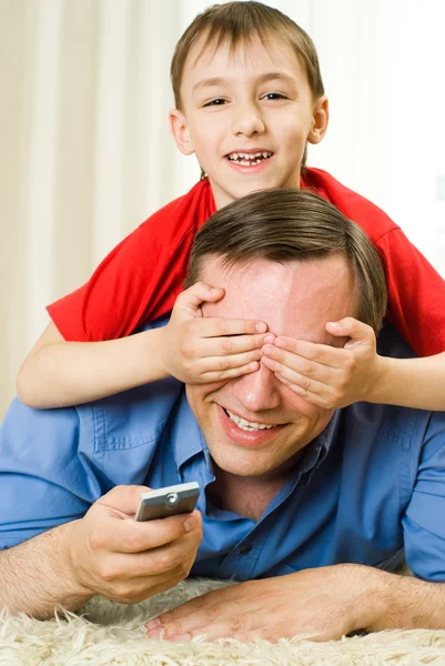 Son and father lying — Stock Photo, Image