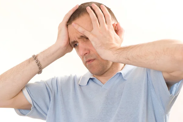 Frustrated man in a blue on a white — Stock Photo, Image