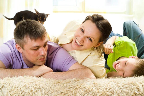 Family on the carpet — Stock Photo, Image