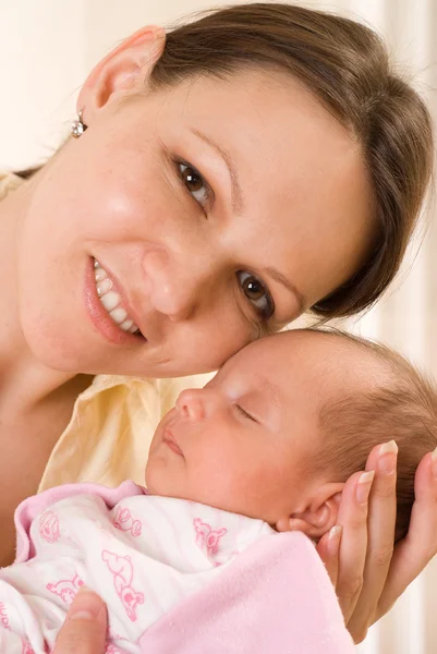 Beautiful woman and newborn — Stock Photo, Image