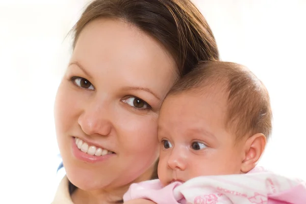 Vrouw met een pasgeboren baby — Stockfoto