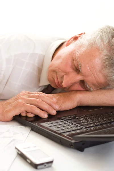 Bisnessman schlafend auf einem Laptop — Stockfoto