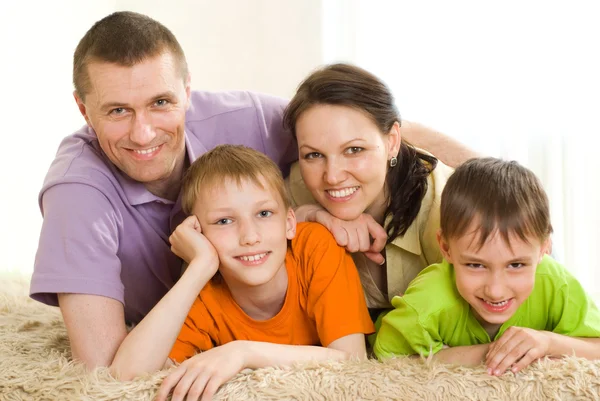 Happy parents with children Stock Image