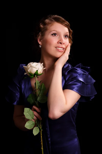 Fin jente med en rose. – stockfoto