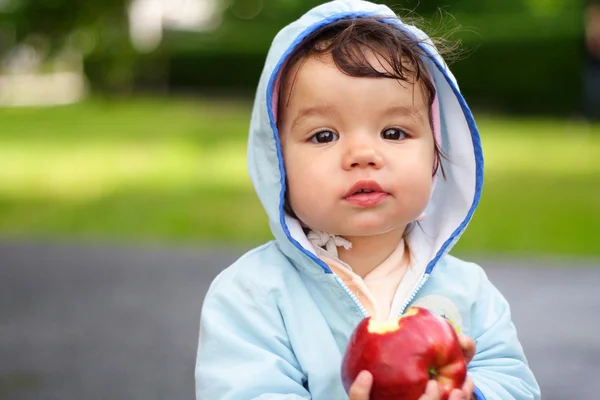 Дитина з apple Стокове Фото