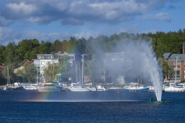 Yacht and rainbow — Stock Photo, Image