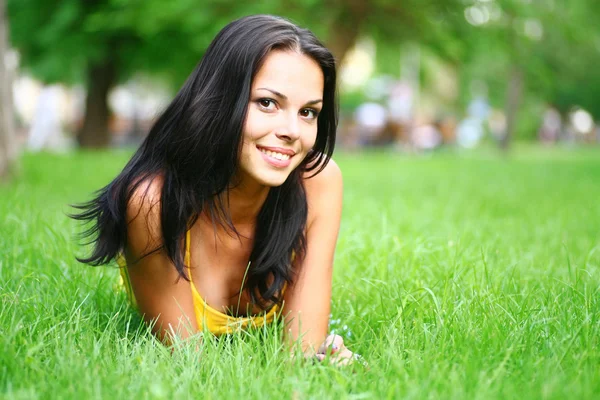 Sexy brunette on grass — Stock Photo, Image