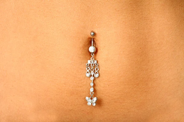 Pretty belly and piercing — Stock Photo, Image