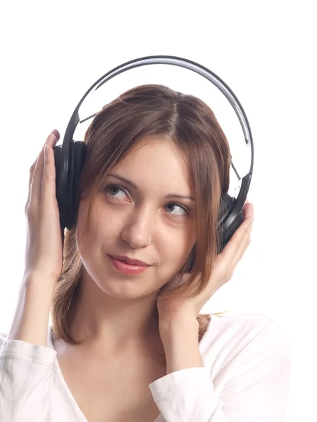 Fiatal nő fülhallgatóval — Stock Fotó